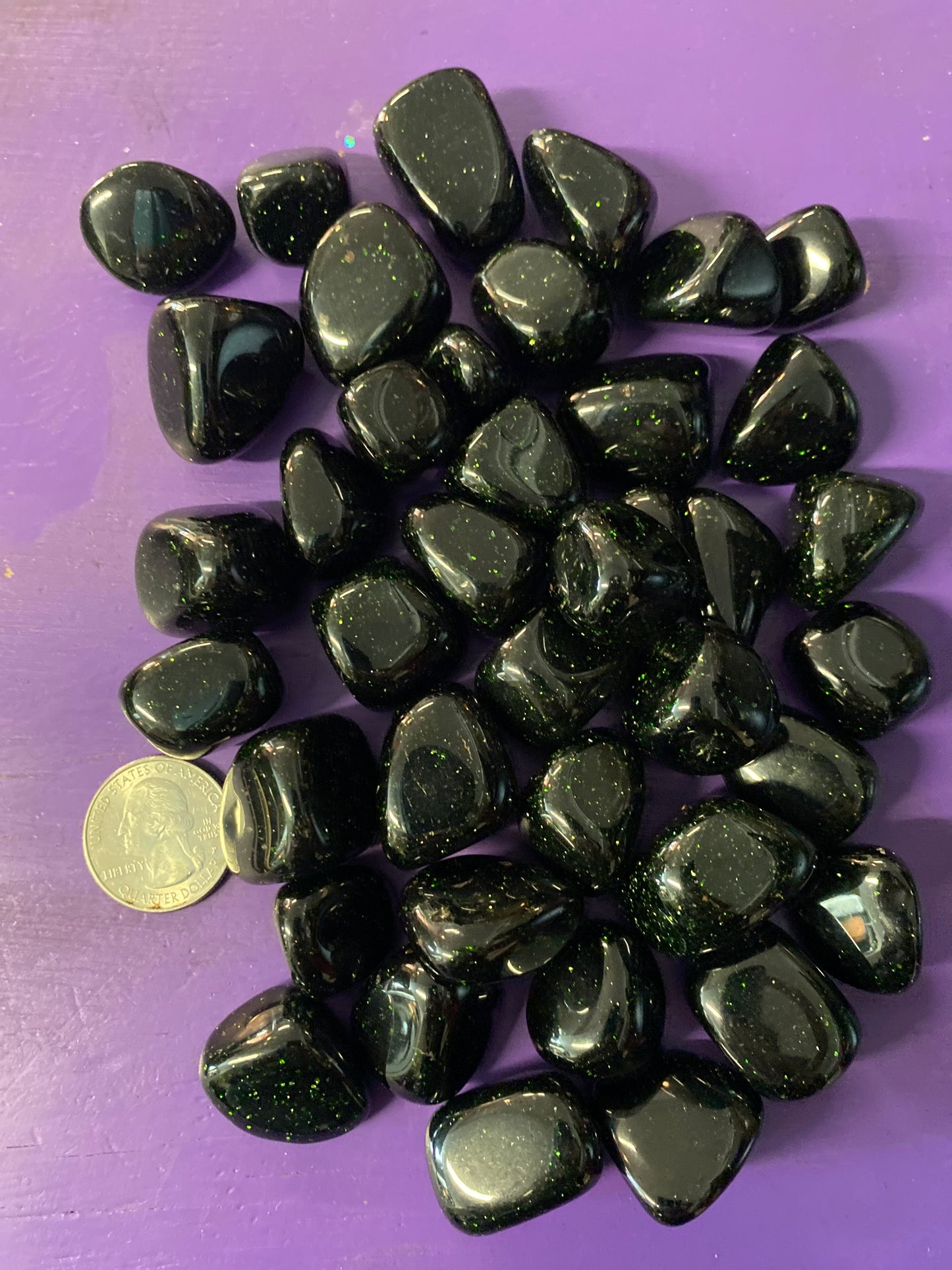 Green Goldstone tumbled stone