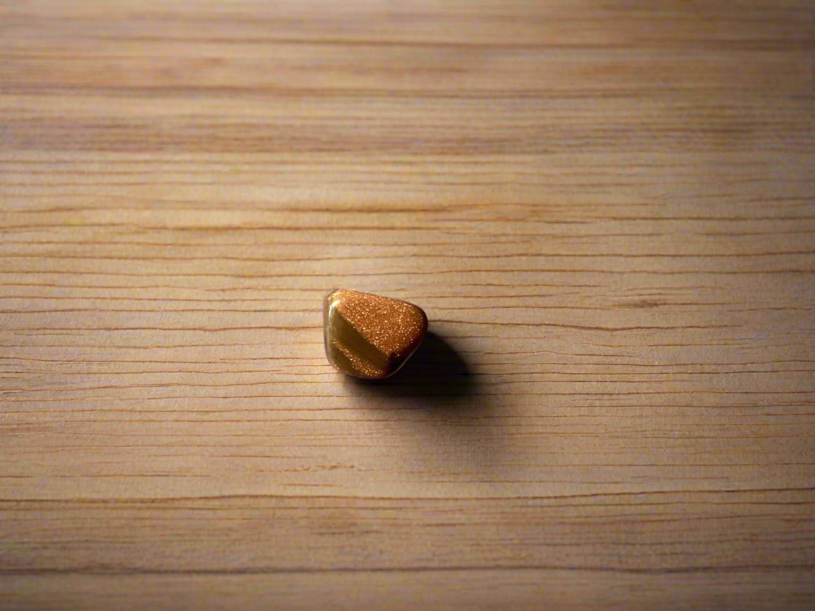 Red Goldstone is a man-made glass with copper oxide that has been slowly crystalized