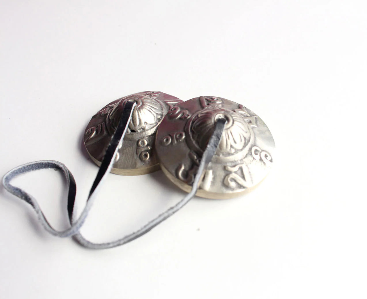 Om Mani Tingsha or Cymbals