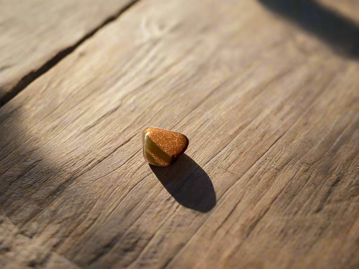 Red Goldstone is a man-made glass with copper oxide that has been slowly crystalized 