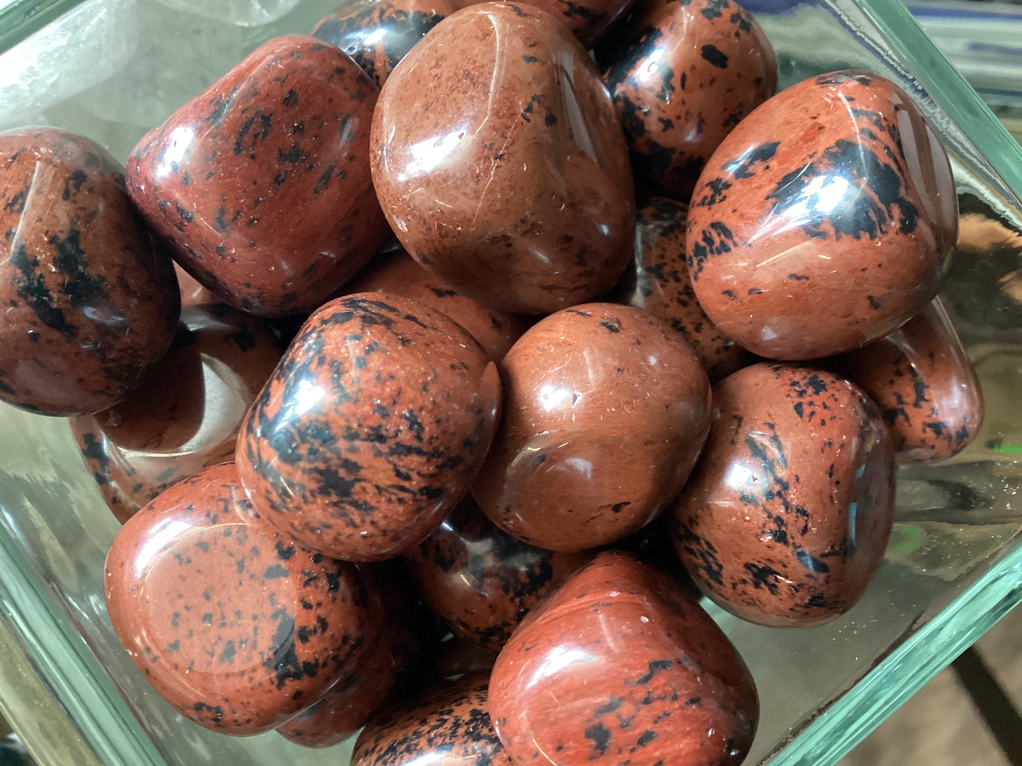 Red Obsidian, also known as Mahogany Obsidian, is a grounding and protective stone connected to the root chakra. It