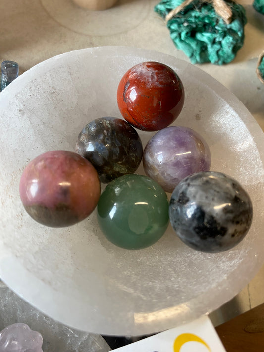 Stone spheres.  Red jasper. Aventurine. Amethyst  rhodonite 