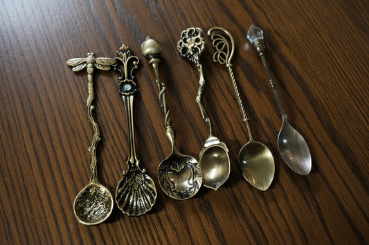 Alloy metal spoons with intricate designs