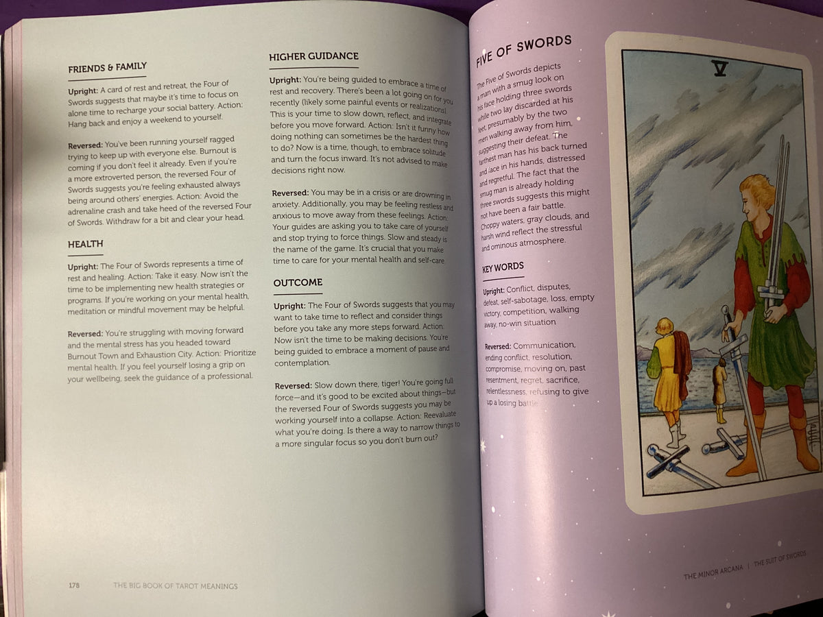 An open book showing printed pages with text sections and a small illustrated figure wearing green and gold clothing on the right page.