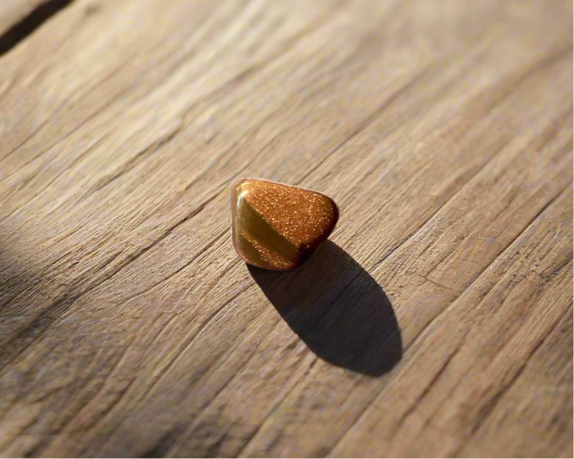 Red Goldstone is a man-made glass with copper oxide that has been slowly crystalized 