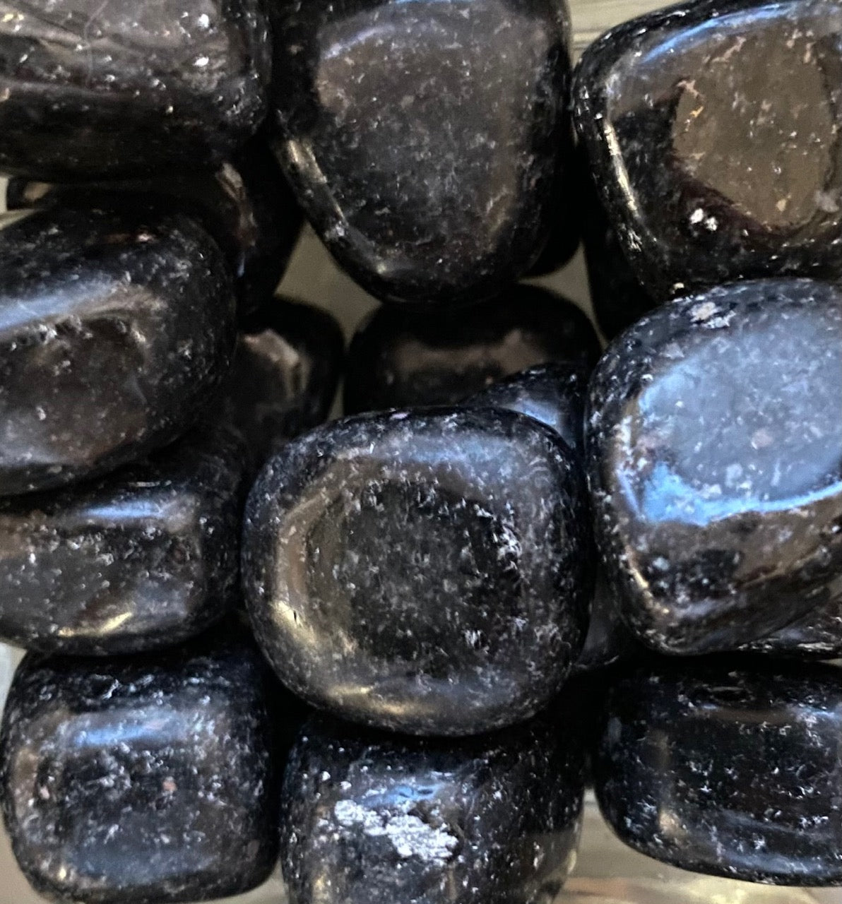 Nuummite (Coppernite) tumbled stone